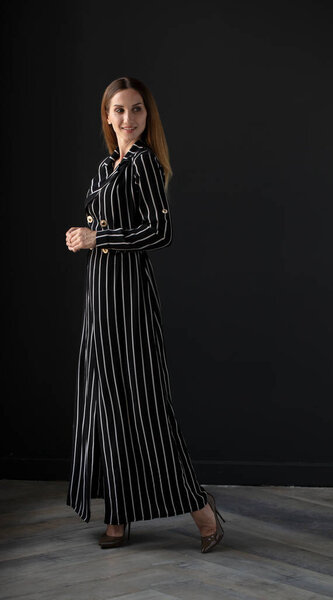 young beautiful  woman posing in studio