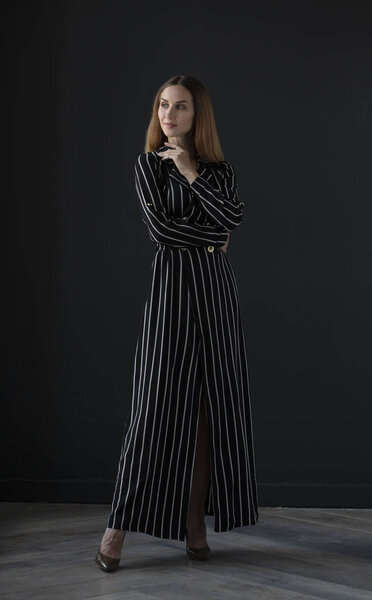 young beautiful  woman posing in studio