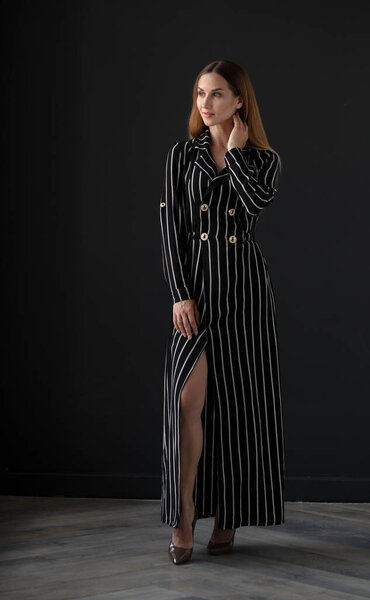 young beautiful  woman posing in studio