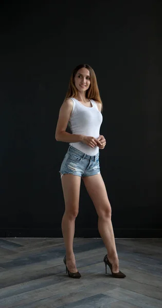 Slim Blonde Young Woman Wearing Top Shorts Posing Dark Background — Φωτογραφία Αρχείου