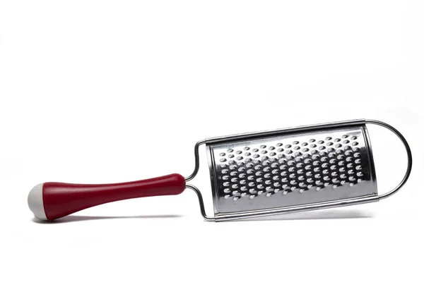 Close Curved Metal Spice Grater Red Handle Isolated White Background — Fotografia de Stock