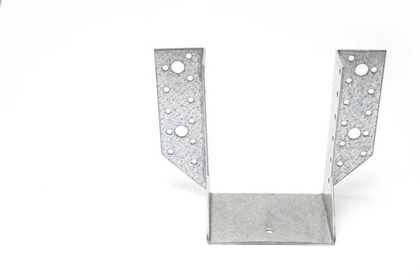 Close up of a steel beam girder or joist hanger as a foundation for a wooden column against white background