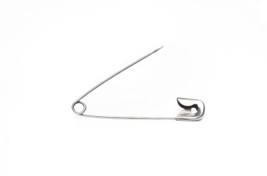 Close up of opened safety pin on white background