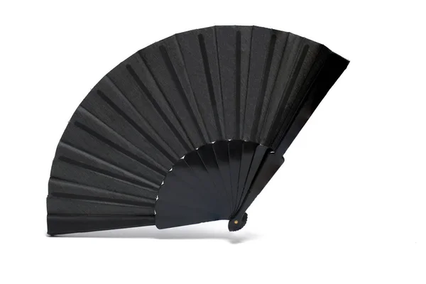 在白种人背景的西班牙文化和哀悼理念下 关闭完全开放的黑色经典风扇 在炎热的日子里为凉爽的空气扇风 图库图片