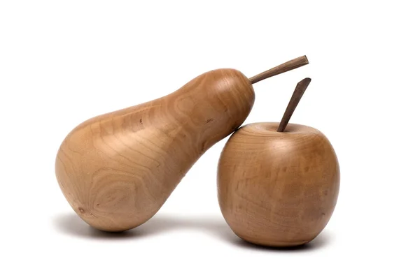 Nahaufnahme Einer Aus Hartholz Gedrechselten Birne Angelehnt Einen Künstlichen Apfel — Stockfoto