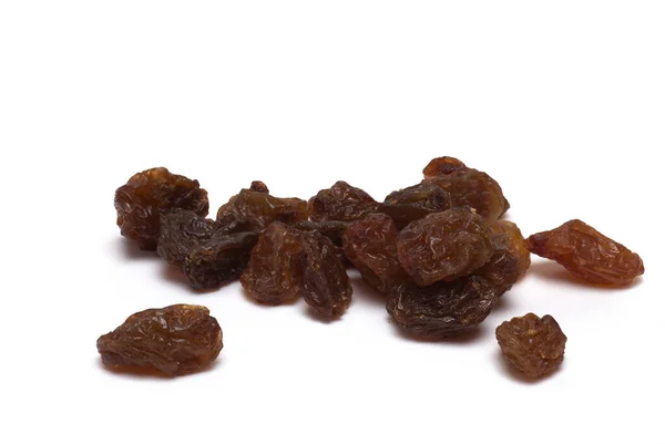 Close Pile Dried Shriveled Raisins Next Each Other White Background — стоковое фото