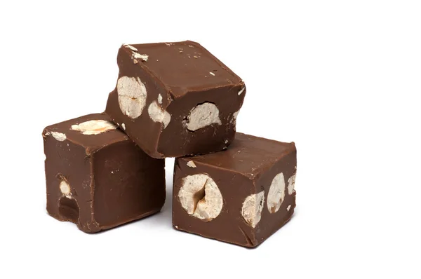 Close Three Stacked Sliced Chocolate Cubes Filled Roasted Peanuts White — 스톡 사진