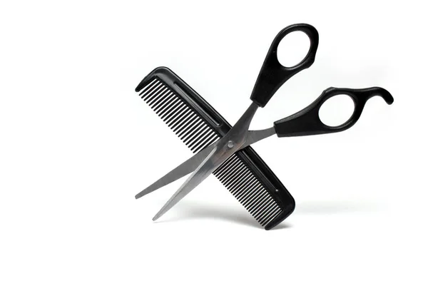 Close Silver Metal Hair Scissors Black Handle Crossed Comb White — Stockfoto