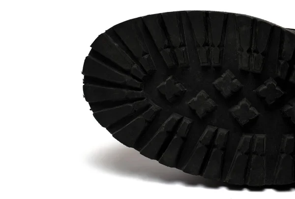 Закрыть Частичный Вид Черной Резиновой Подошвы Грубым Профилем Прыгающего Ботинка — стоковое фото