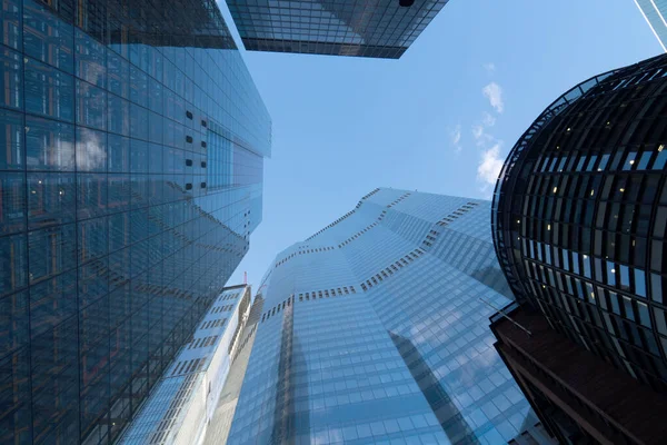 View up blue sky skyscrapers and high-rise buildings concept for banks business stock market and wall street