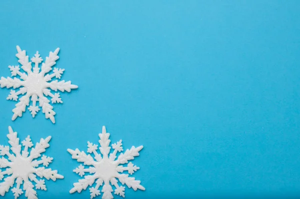 Christmass flatlay białe płatki śniegu w kształcie ramki — Zdjęcie stockowe