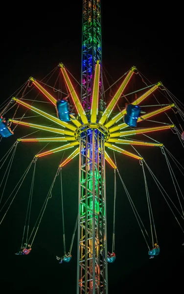 Amusement park at night in lights — Stock Photo, Image