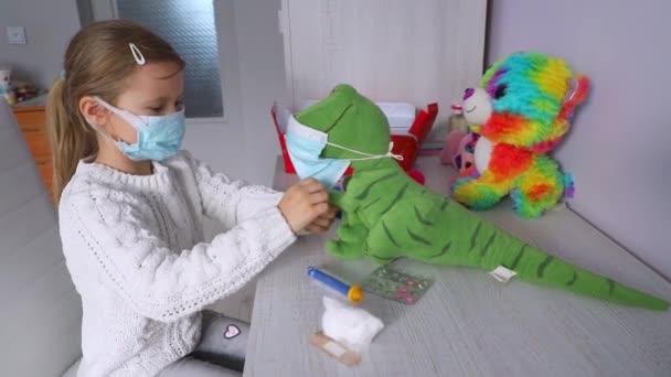 Year Old Girl White Sweater Medical Mask Her Face Plays — Wideo stockowe