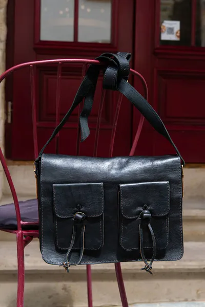 Close-up photo of black leather bag corporate. — Stock Photo, Image