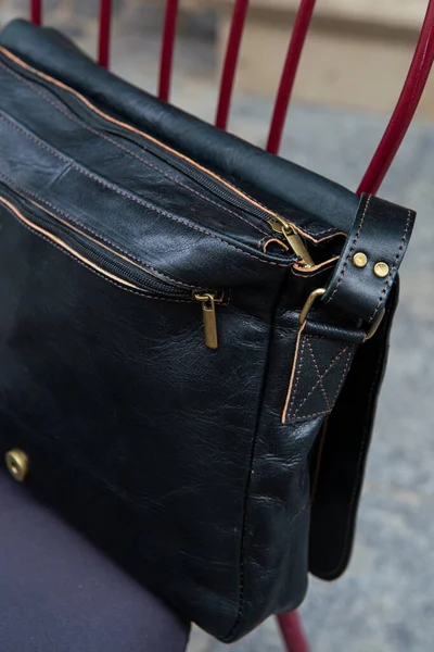 Close-up photo of black leather bag corporate. — Stock Photo, Image