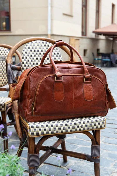 Close-up photo of brown leather bag corporate. — Stock Photo, Image