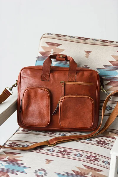 Close-up photo of red leather bag corporate. — Stock Photo, Image