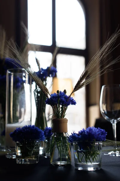 A set of furniture in a cafe. Vase with flowers decor for the restaurant.