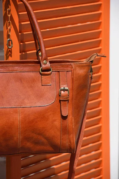 Close Photo Orange Leather Bag Wooden Blinds Outdoors Photo — Photo