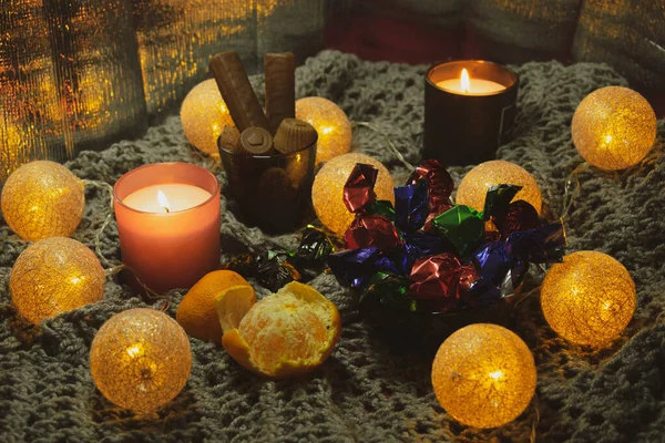 Christmas Still Life Sweets Two Candles Garland Form Balls Woven — Stock Photo, Image