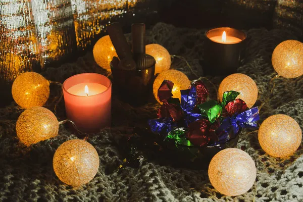 Christmas Still Life Sweets Two Candles Garland Form Balls Woven — Stock Photo, Image