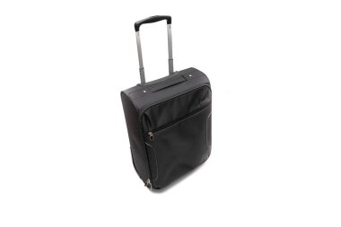 Siyah bir yük çantası. Beyaz arka planda izole edilmiş. Tatil kavramı.