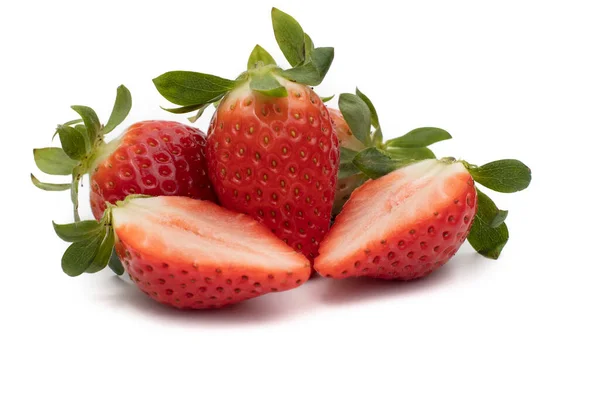 Handful Whole Strawberries Green Leaves One Them Cut Half Isolated — Stock Photo, Image