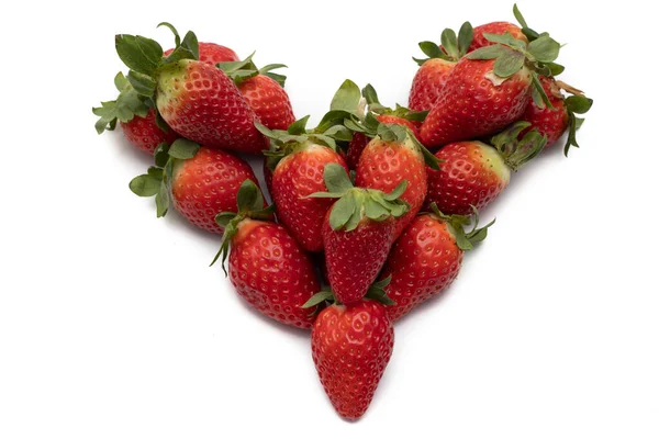 Bunch Whole Strawberries Green Leaves Laid Out Shape Heart Isolated — Stock Photo, Image