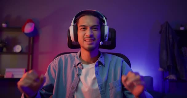 Happy Asia Guy Gamer Wear Headphone Participation Play Video Game — Stock Video