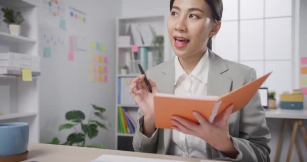 Young Asia Cheerful Professional Woman Sitting Desk Laptop Computer Hold — Stock Video