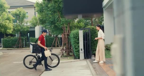 Young Asian Delivery Man Bicycle Red Uniform Carry Case Box — Stock video