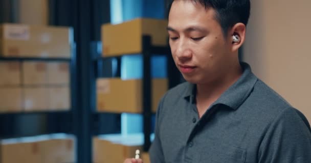 Asian Businessman Wear Earphone Use Digital Tablet Online Meeting Client — Vídeos de Stock
