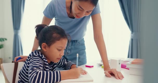 Asian Toddler Girl Sweater Sit Front Desk Notepad Use Pencil — Stock Video