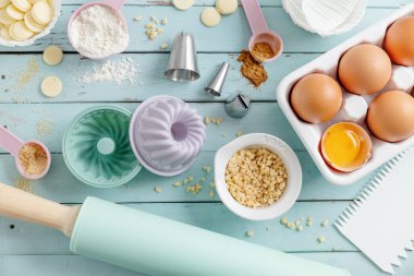 Baking concept with ingredients on blue background. Top View. 