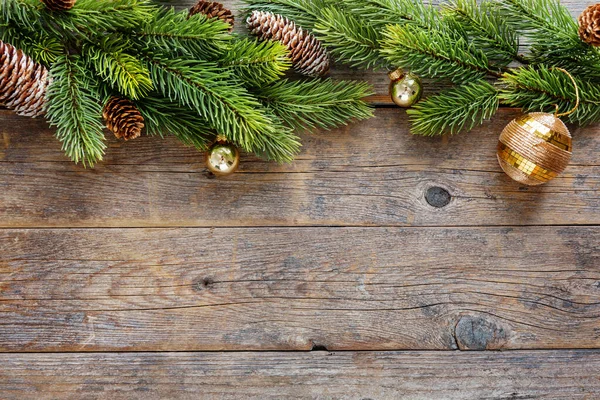 Christmas Background Baubles Fir Present Old Wooden Table — Stockfoto