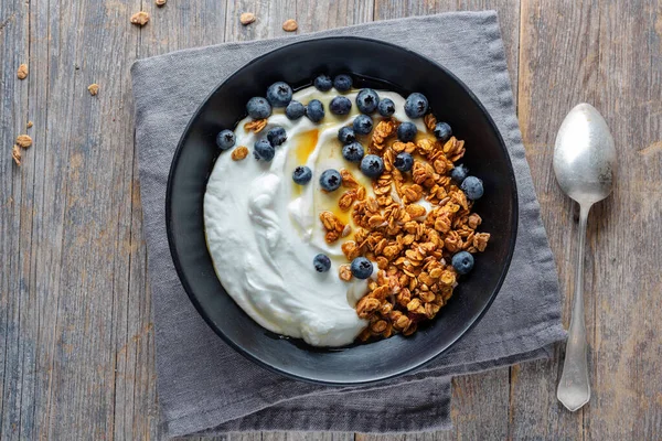 Appetizing Homemade Muesli Berries Yogurt Served Bowl Wooden Background — стоковое фото