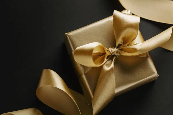 Christmas Conceptual Background Golden Gift Ribbon Dark Top View — Φωτογραφία Αρχείου