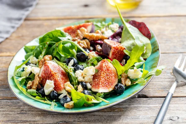 Tasty Appetizing Salad Arugula Figs Cheese Nuts Served Table Closeup — Zdjęcie stockowe