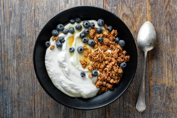 Appetizing Homemade Muesli Berries Yogurt Served Bowl Wooden Background — стоковое фото