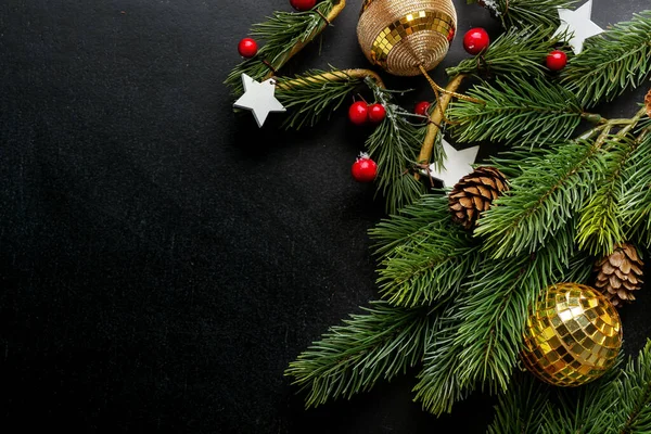 Christmas Conceptual Background Baubles Fir Branches Dark Top View — Φωτογραφία Αρχείου