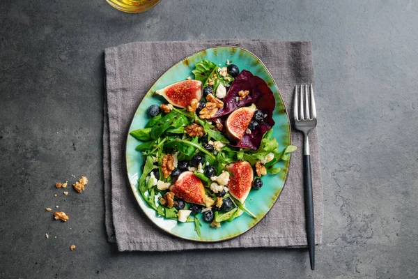 Tasty Appetizing Salad Arugula Figs Cheese Nuts Served Table Closeup — Fotografia de Stock