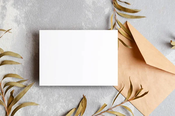 Greeting Invitation Card Mockup Craft Paper Envelope Gold Eucalyptus Twigs — Zdjęcie stockowe