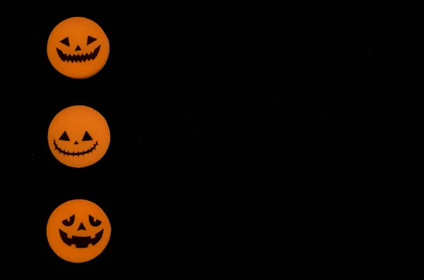 Three variants of the Jack-o-lantern on a black background. The Halloween symbol. — Stock Photo, Image