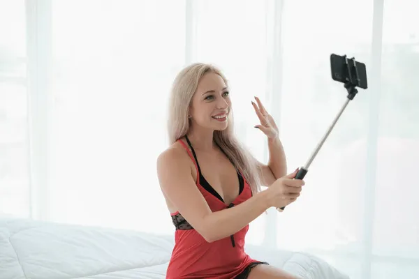 Sexy Caucasian Woman Holding Selfie Stick Show Sign Language — Stock Photo, Image