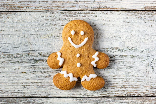One Christmas Gingerbreads Man Patterns Glaze White Wooden Background Top — Stock Photo, Image