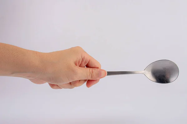 Woman Hand Holding Silver Spoon White Background Close — 图库照片