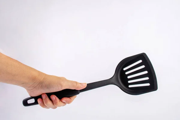 Hand Plastic Black Spatula Frying Pan Isolated White Background — Foto de Stock