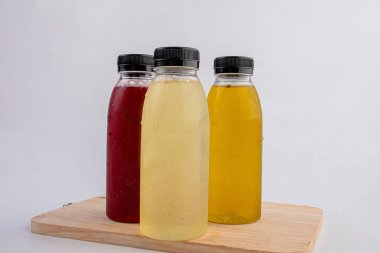 fruit and vegetable juice bottles isolated on white background,Close-up