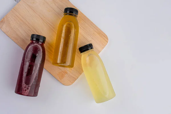 fruit and vegetable juice bottles isolated on white background,Close-up