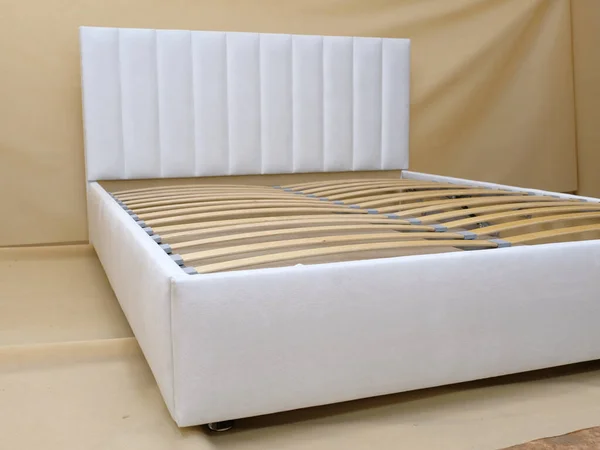 Production Bed Upholstered White Fabric Mattress Wooden Slats Raised Frame — Stock Photo, Image